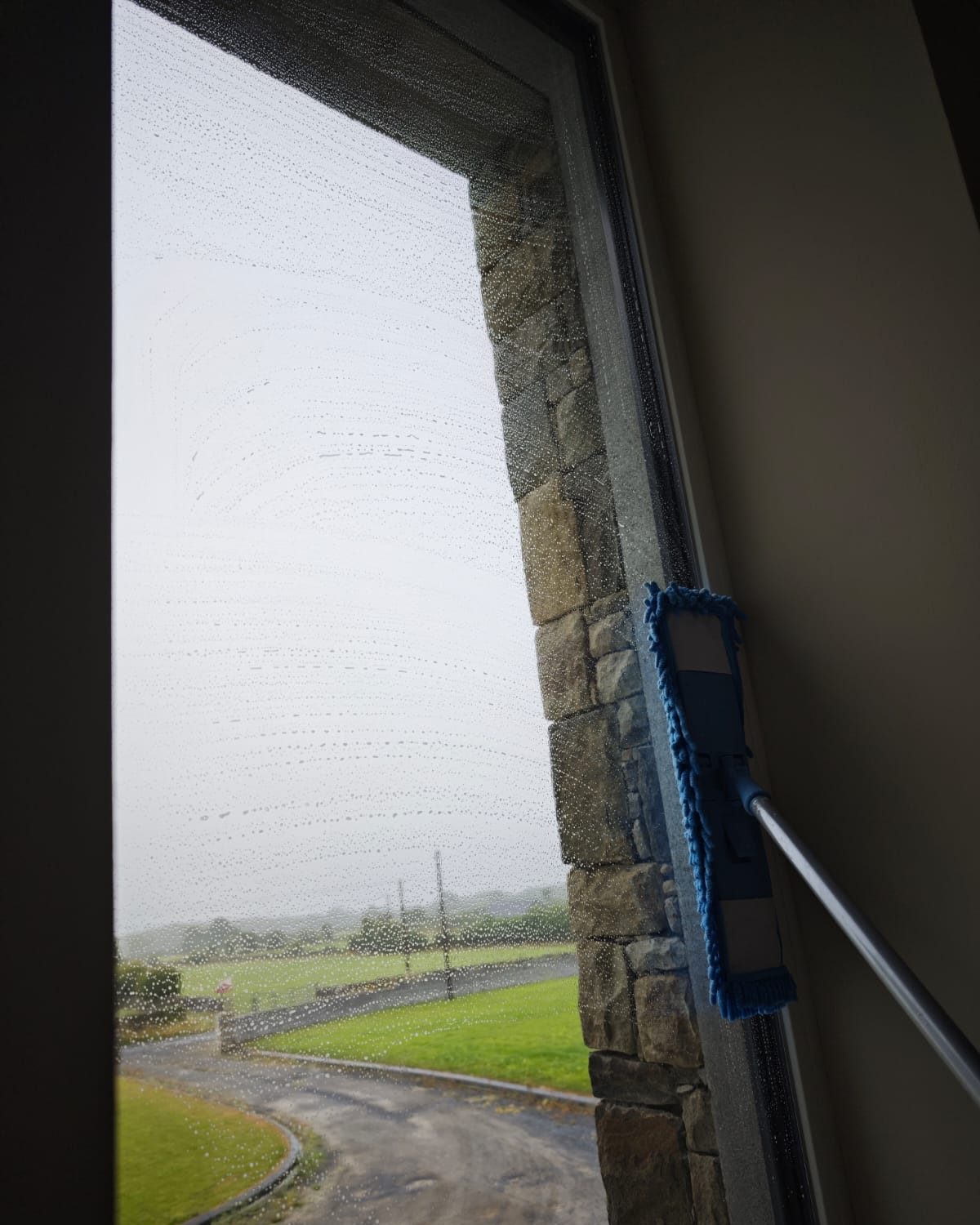Interior glass being cleaned with a microfibre pad